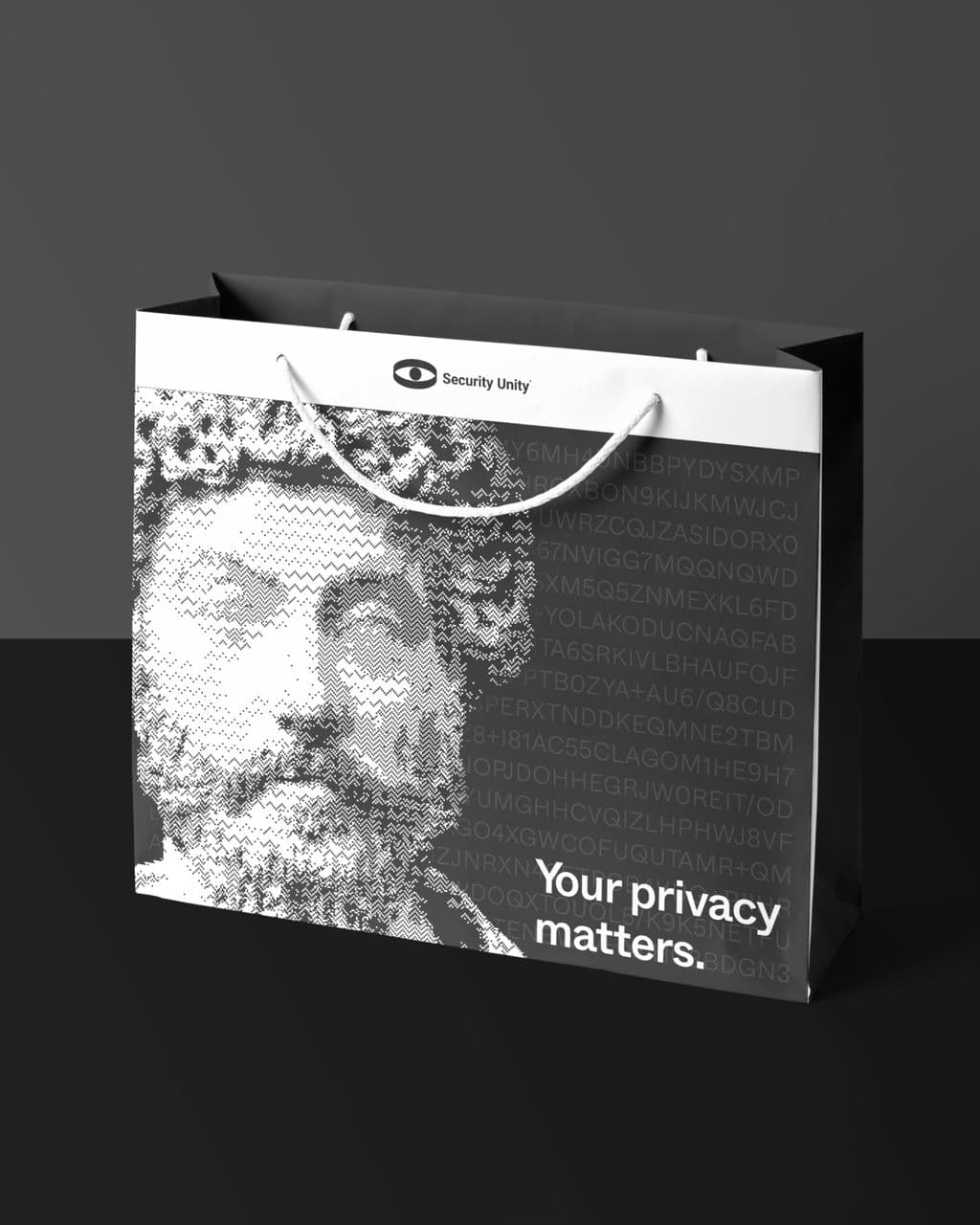 A Security Unity shopping bag printed with a classical bust made of text, and the line "Your privacy matters."